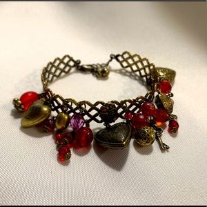 Gold, red heart design bracelet